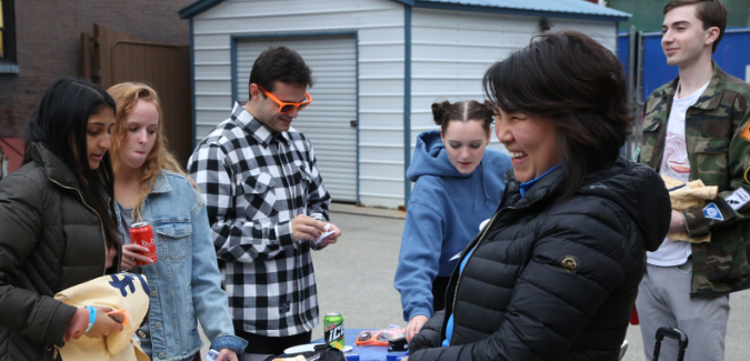 A photo of Pitt students and members of the Oakland community enjoying one of our Be a Good Neighbor block parties