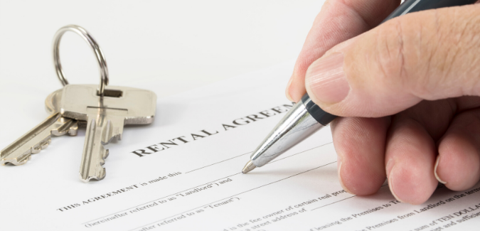 A person signing a lease. 